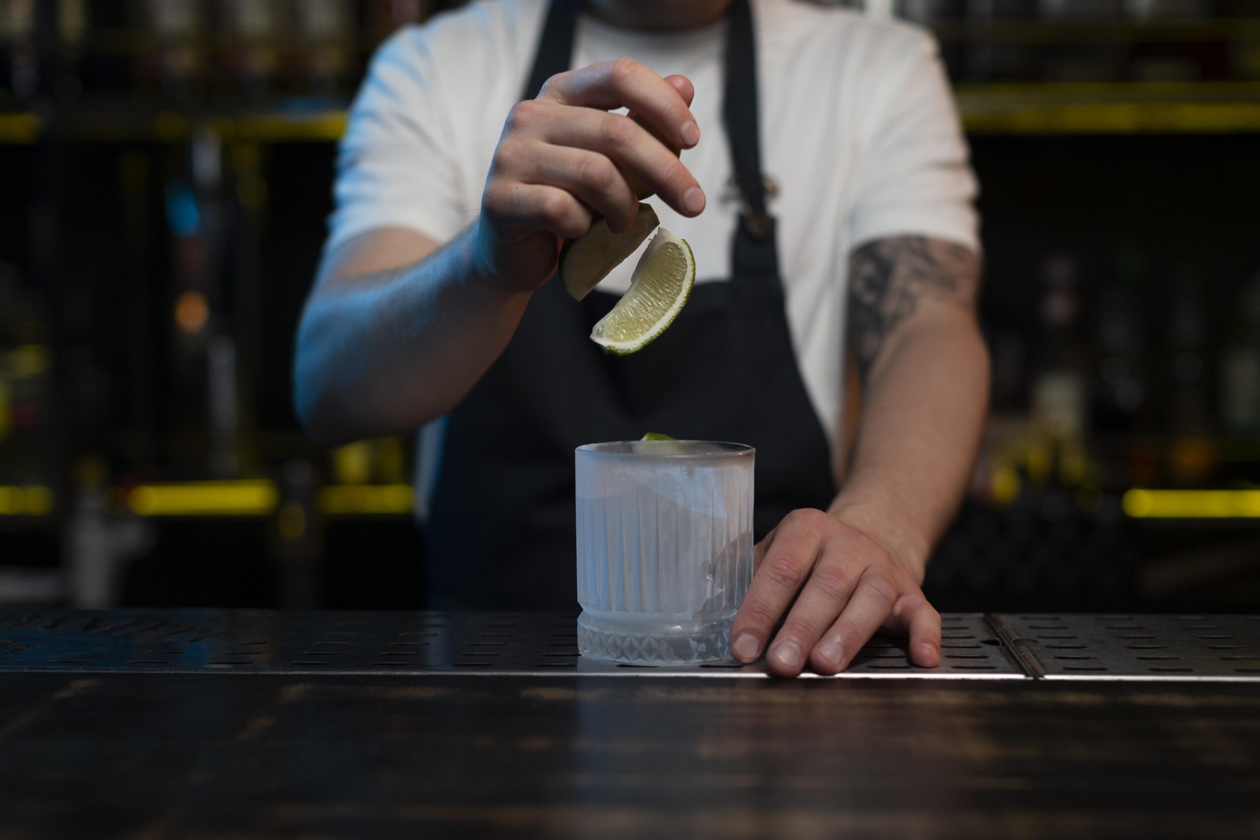 male-bartender-making-delicious-cocktail